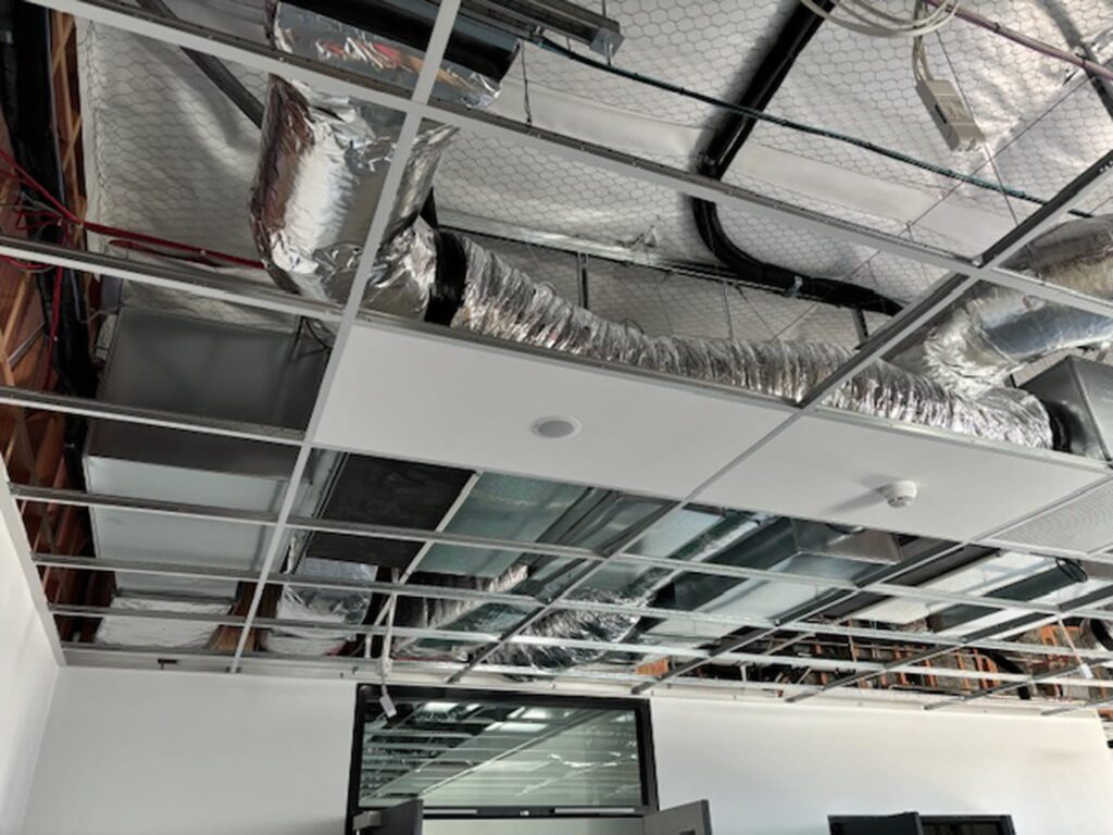 Ceiling-mounted commercial HVAC and ventilation systems installed by Beattie Air at Waterloo Business Park, Halswell, Christchurch, featuring energy-efficient air conditioning and heating systems